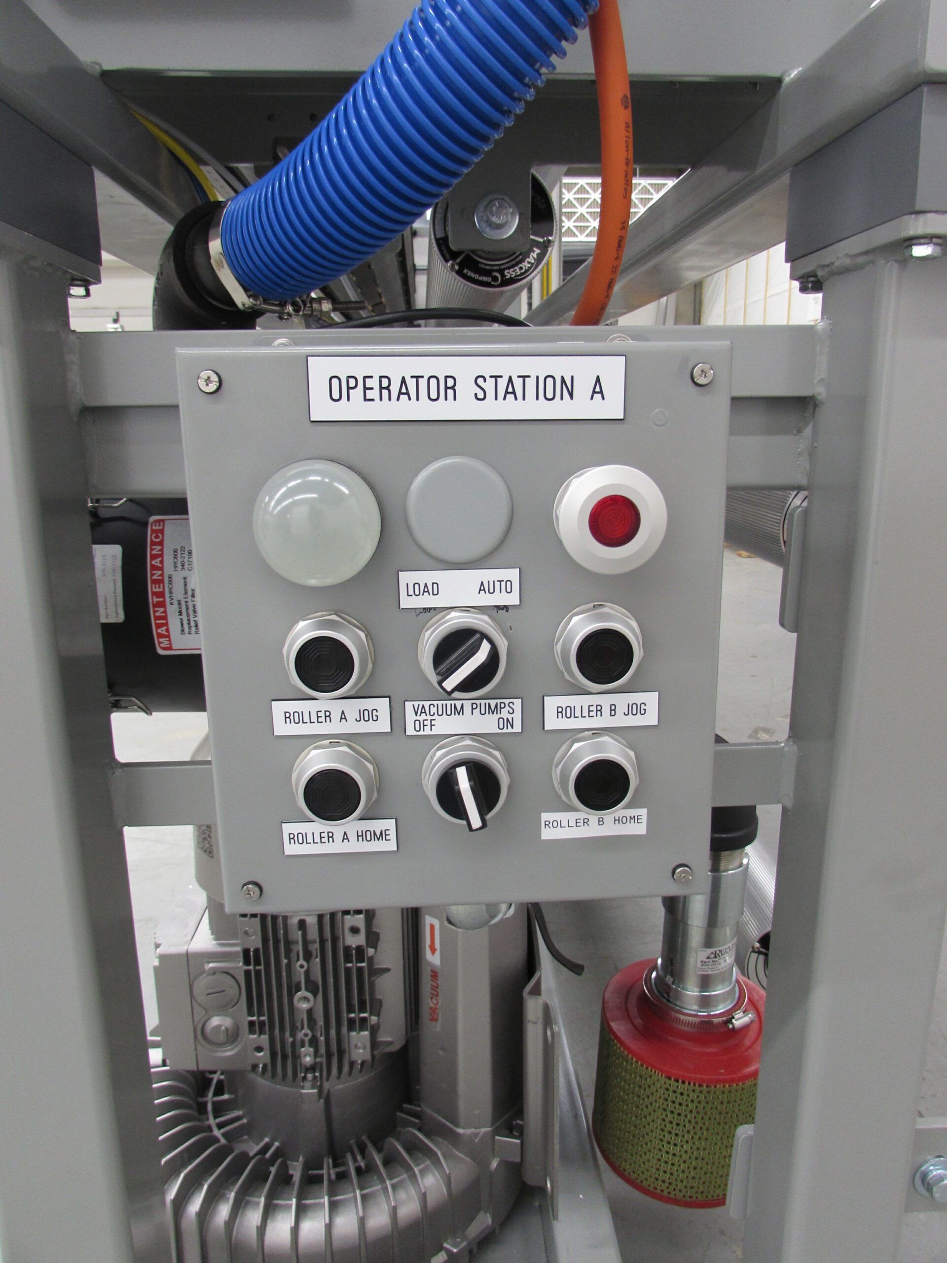 end of row tape application machine designed by D&R packaging for large rolls of film, plastic wrap, or cling wrap