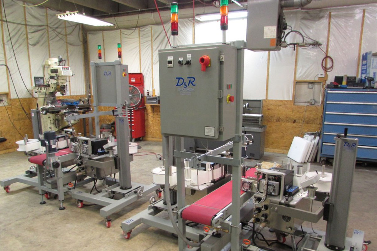 Dual-Opposing Cornerwrap Print-Apply Labeling System